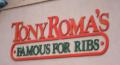 The red and green lettering on the Tony Roma Restaurant was sprayed in 2000 and still retains the newly sprayed look.